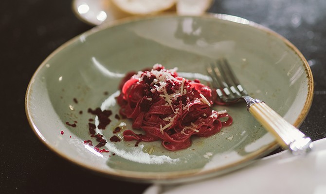 Hotel Reiters Supreme - Red pasta dish on a white plate